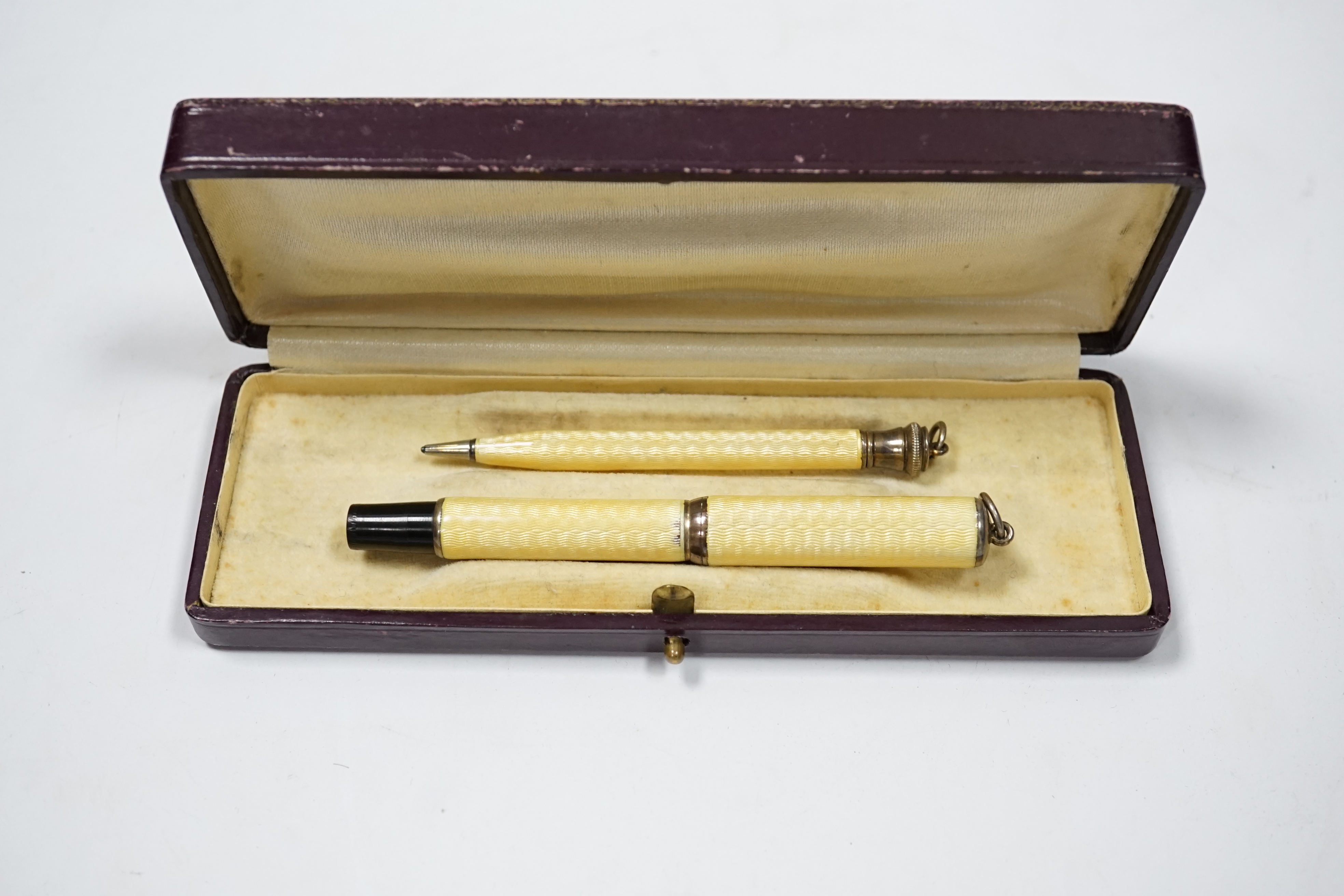 A rare Kaweco yellow enamel fountain pen and pencil set